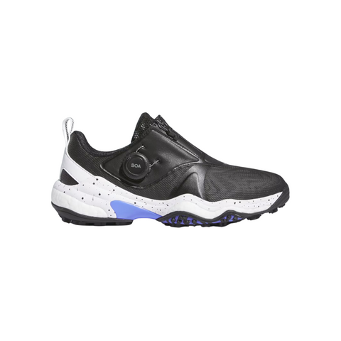 The Adidas Codechaos Boa 25 Spikeless Womens Golf Shoes feature a black and white slip-on design with a Boa Fit System dial, speckled midsole, and blue sole accents—perfect for stylish golfers seeking comfort and performance.