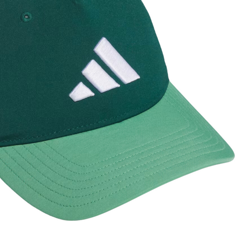 A close-up of the Adidas Colourblock Snapback Hat, a green snapback with a white Adidas logo on the front left panel, a lighter green brim, and a moisture-wicking sweatband for comfort. Brand: Adidas.