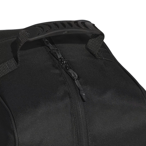 Close-up of the Adidas Golf Travel Cover in black, featuring a zipper and textured plastic handle on top. Its woven pattern highlights the durable material. The travel cover is shown against a plain white background.