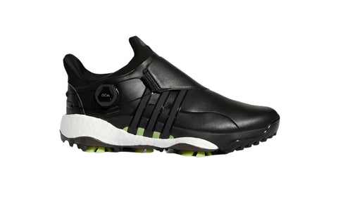 The Adidas Mens Tour360 22 Boa Golf Shoes in Core Black/Core Black/Iron Metallic feature a sleek black design, white and green sole, strap accents, and a BOA Fit System dial closure inspired by premium leather golf shoes. Isolated on white.
