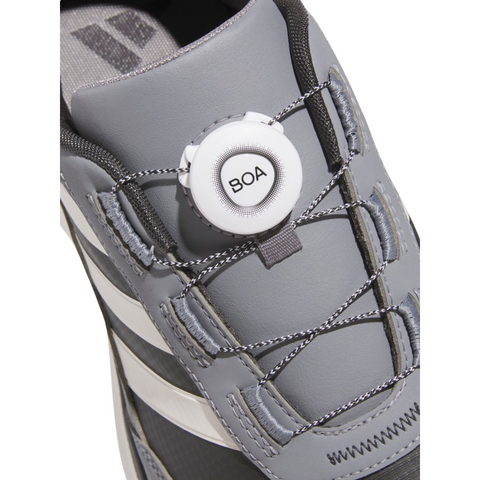 Close-up of the Adidas S2G 24 BOA Men’s Golf Shoes in Carbon, Chalk White, and Grey Three, a spikeless men’s golf shoe with a white BOA Fit System dial closure and elastic laces across the top.