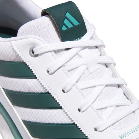 Close-up of the Adidas S2G 24 Men’s Golf Shoes in Cloud White, Wonder Silver, and Silver Pebble, featuring textured fabric and white laces. The Adidas logo appears on the tongue of these stylish spikeless golf shoes.