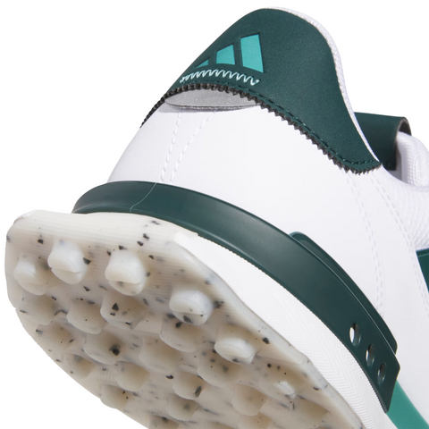 Close-up of the heel and sole of Adidas S2G 24 Men’s Golf Shoes in Cloud White/Wonder Silver/Silver Pebble, showing textured studs on the spikeless sole and a teal Adidas logo on the back.