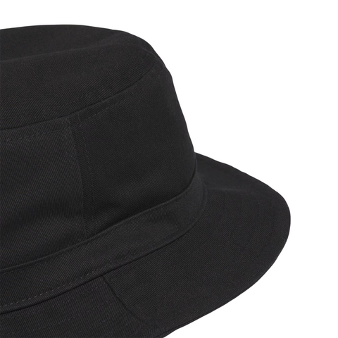 Close-up of the Adidas Solid Bucket Hat in black, featuring front and side panels with visible stitching, designed by Adidas for sun protection against a white background.