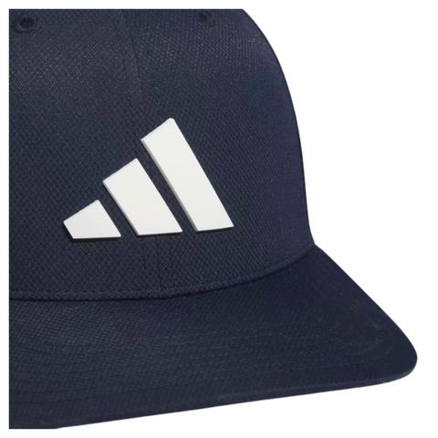 A close-up of the Adidas Tour Snapback Golf Cap in dark navy blue, with the signature white Adidas logo of three diagonal stripes on the adjustable snapback front panel.