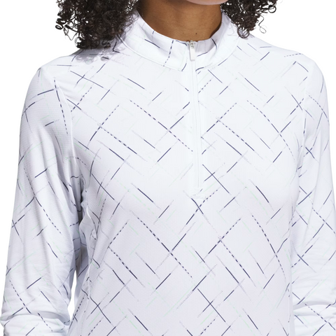 Wearing the Adidas Ultimate365 Printed Quarter-Zip Long-Sleeve Polo Shirt in white, only the lower face, neck, and torso are visible; it features a subtle geometric line pattern in gray and light blue.