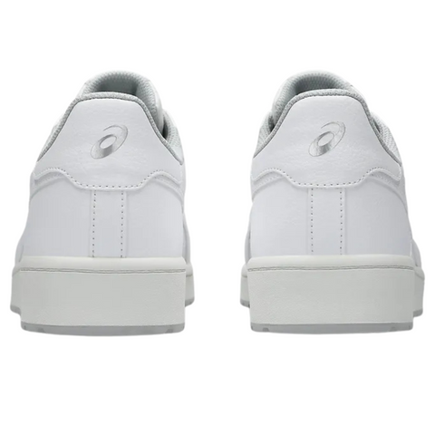 Two white Asics Japan S Men’s Golf Shoes seen from the back, featuring the ASICS logo on each heel. These shoes have a clean, minimalist design with light gray textured soles and a soft gray inner lining.