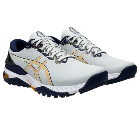 The Asics Men's Gel Kayano Ace 2 Wide Golf Shoes in light gray and navy, featuring yellow accents, white laces, and a rugged black outsole, are shown side by side on a white background.