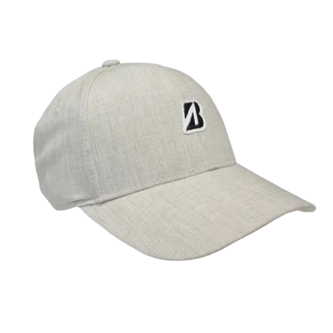 The Bridgestone Mini Patch Cap in light grey features a small black and white Tour B logo, textured fabric, and curved brim. Get it free when you buy 2 dozen (24) Bridgestone golf balls! Ideal for Bridgestone fans.