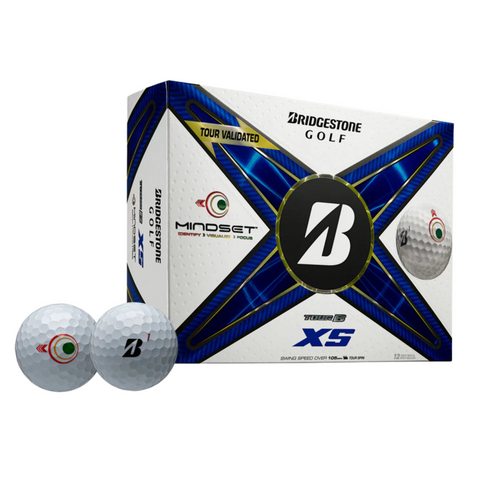 A box of Bridgestone Tour B XS MindSet Golf Balls is displayed with two in front; the blue and gold packaging features the Bridgestone logo, MindSet branding, and emphasizes tour-level spin for serious players.
