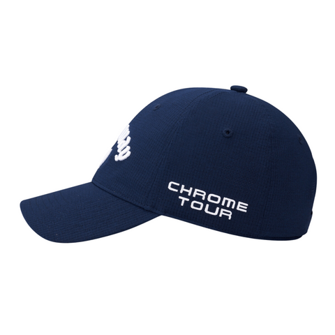 The Callaway Elyte Tour Authentic Performance Pro Hat in navy blue features white CHROME TOUR embroidery on the side, a small white front design, curved brim, classic eyelets, and moisture-wicking fabric to keep you cool.