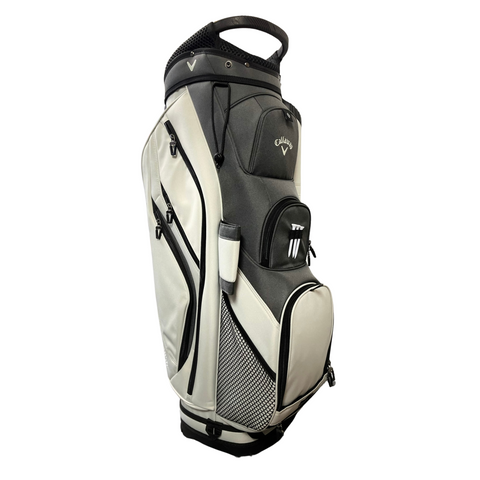 The Callaway Forrester Cart Bag 2025 by Callaway, in gray and white, features a 14-way top, multiple zippered pockets, a side handle, and a mesh section. It stands upright on a white background.