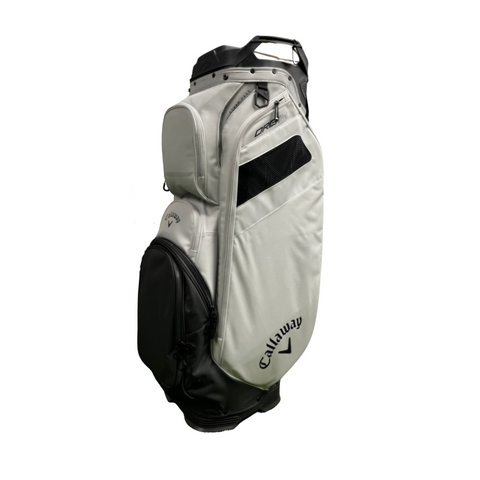 The Callaway ORG 14 Cart Bag 2024 by Callaway, in white and black, features a 14-way top divider, multiple zippered compartments, a carrying handle, and the Callaway logo near the base. Shown against a plain white background.