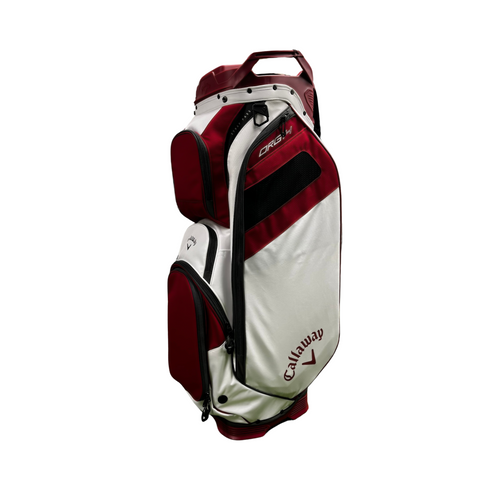 The Callaway ORG 14 Cart Bag 2024 in white and maroon features a 14-way top divider, multiple zippered pockets, and a top handle, shown standing upright against a white background.