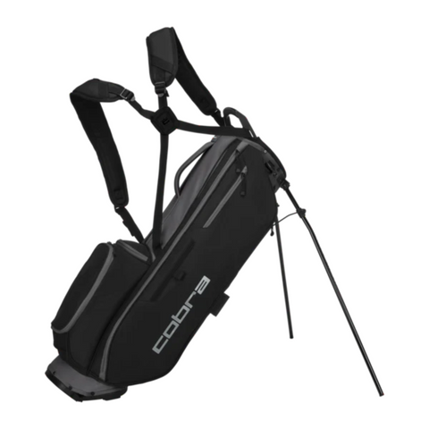 The Cobra Ultralite Pro Stand Bag 2025, a lightweight black bag with dual shoulder straps, multiple zippered pockets, and extended stand legs, is shown on a white background. This Cobra bag is designed for easy carrying and convenience.