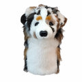 Daphne's Australian Shepherd golf driver headcover, front view showing the white, brown, black and grey plush markings, dark eyes, black nose and protective body on a clean white background