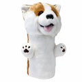 Daphne's Corgi golf driver headcover, front view showing the white and brown plush face, tongue, raised paws with paw-pad details and protective body on a clean white background