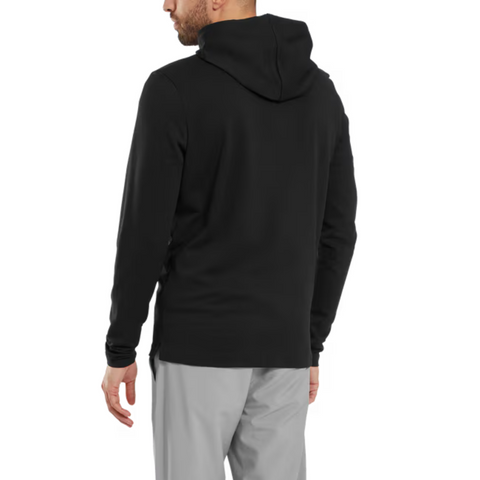 A man is shown from the back wearing a FootJoy Men's Ottoman Jacquard Pullover Hoodie in black and light gray pants, standing against a plain white background.