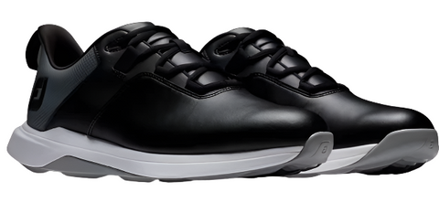 The FootJoy Prolite Mens Golf Shoes in black feature white soles, black laces, and a gray heel accent—stylish and comfortable spikeless golf shoes from FootJoy, ideal for on-course performance. Displayed on a white background.