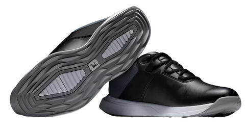 A pair of black FootJoy Prolite Mens Golf Shoes is shown—one upright and one on its side displaying the spikeless tread pattern on the gray and white soles.