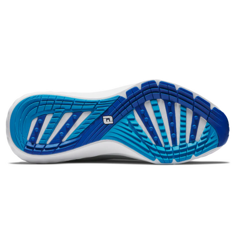 The image shows the sole of a running shoe with blue, white, and navy tread, featuring textured grooves and small raised dots for grip—similar to the flexible, cushioned outsole on the FootJoy Quantum Mens Golf Shoes by FootJoy.