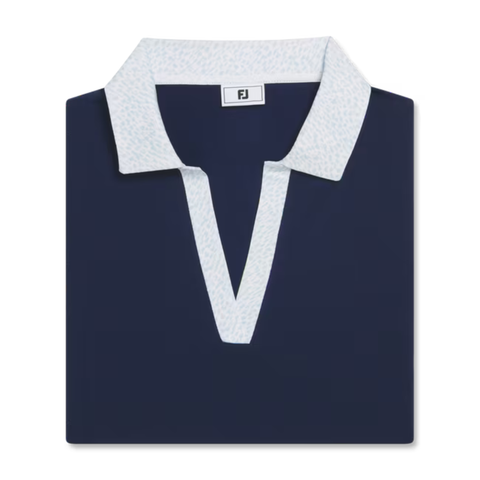 The FootJoy Women’s Cap Sleeve Print Shirt in Navy/Skyway, crafted from ProDry fabric, features a patterned collar and matching V-neck trim. Displayed folded on a white background.