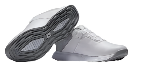 A pair of FootJoy Women’s ProLite BOA Golf Shoes in White/Grey is shown, with one shoe upright and the other revealing the black-and-white sole, highlighting their lightweight design and innovative BOA Fit System.