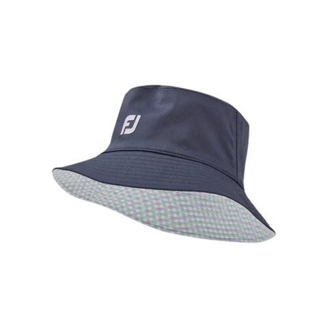 FootJoy reversible bucket hat in navy with a white logo on the front. The brim is lined with a light gingham pattern, offering two styling options for sun protection and comfort.