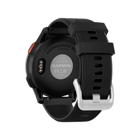 The image shows the back of a black Garmin Approach S44 GPS Watch with a textured silicone band, silver buckle, charging pins, model details, and 43MM marked on the case back.