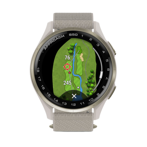 The Garmin Approach S50 GPS Watch by Garmin displays a colorful course map with green fairways, trees, a river, and distance markers (76 & 245 yds). It features a gray band and metallic bezel labeled “Approach S50.”.
