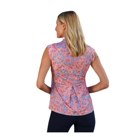 Back view of women's Greg Norman Perch Cap Sleeve Polo in pink with blue floral print, worn by a model. Features cap sleeves and a lightweight performance fabric.