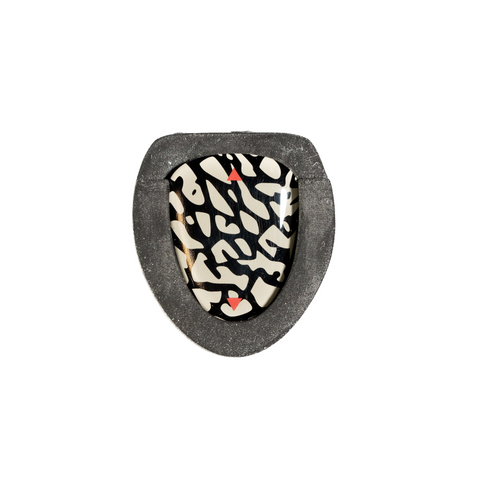 The GripDrip Par 3 Putter Grip by GripDrip features a black border and a glossy center with a white, cream, and red abstract animal print design.