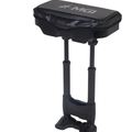 The MGI ZIP Trundler Seat features a black padded seat with the MGI logo, two adjustable metal legs, and a wide stable base for golf course comfort.