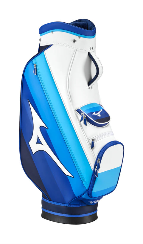 The Mizuno 2025 Tour Cart Bag features blue, white, and light blue colors, multiple zippered pockets, a sturdy handle, and the Mizuno logo on the side—ideal as a tour-level golf cart bag.