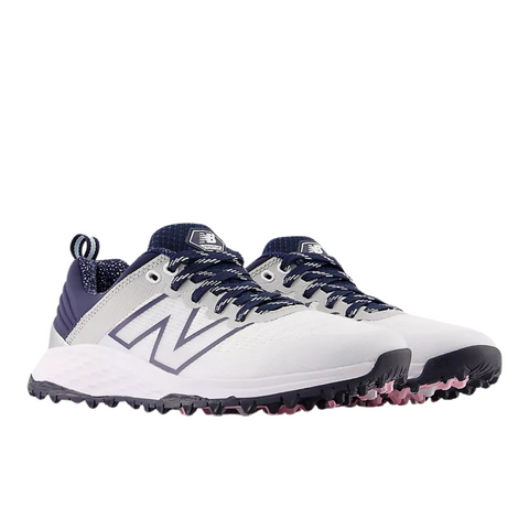 The New Balance Fresh Foam Contend V2 Womens Golf Shoes in white/navy feature the signature N logo, spikeless black soles for grip, mesh tongues, laces, and lightweight cushioning for all-day comfort.