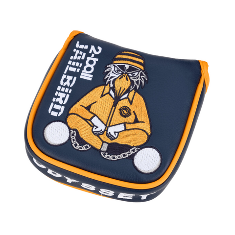 This navy and orange headcover by Odyssey fits the Ai-ONE CRUISER Jailbird 2-Ball DB Putter, featuring an embroidered cartoon bird in jail attire, cross-legged with handcuffs and ball & chain, plus “2-ball JAILBIRD” text.