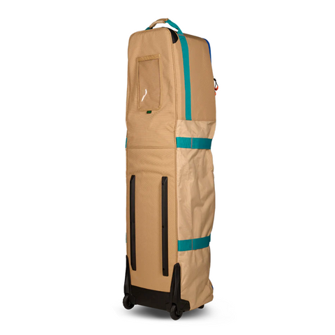 The Ogio Alpha Mid Travel Cover by Ogio is a tall, beige rolling travel bag with teal straps, black wheels, a top handle, transparent pocket, and rectangular shape—designed for golfers seeking practical and durable club protection.