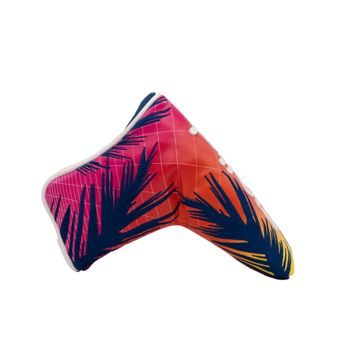 The PING 2025 Hawaii Collection Electric Sunset Blade Putter Headcover by Ping features a vibrant gradient in pink, orange, and yellow with blue palm leaf silhouettes and a subtle white grid pattern for stylish putter protection.