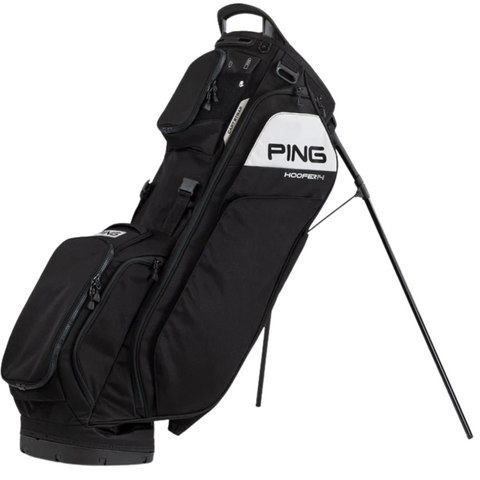 The Ping PING Hoofer 14 Stand Bag, shown in black with a 14-way top divider, multiple zippered pockets, and the stand extended, is displayed on a white background.