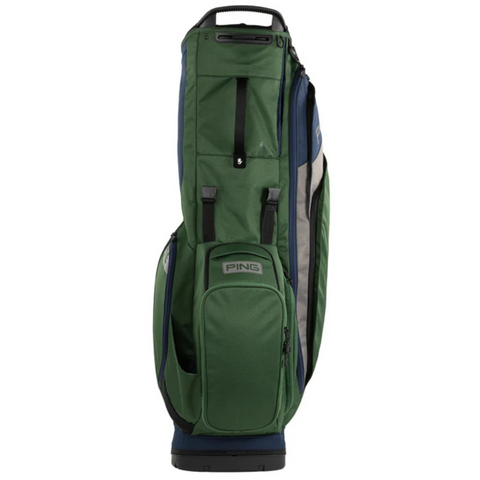 The Ping Hoofer 231 Stand Bag in green and blue stands upright, with multiple zippered compartments, a sturdy top handle, and an ergonomic strap system for easy carrying.