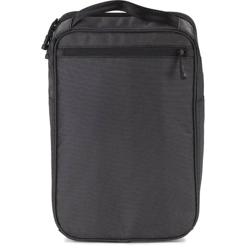 The Ecco Ping Shoe Bag is a black, rectangular soft-shell bag with a front zippered pocket and top carrying handle—its minimalist design makes it perfect for pairing with your laptop bag for organized travel.