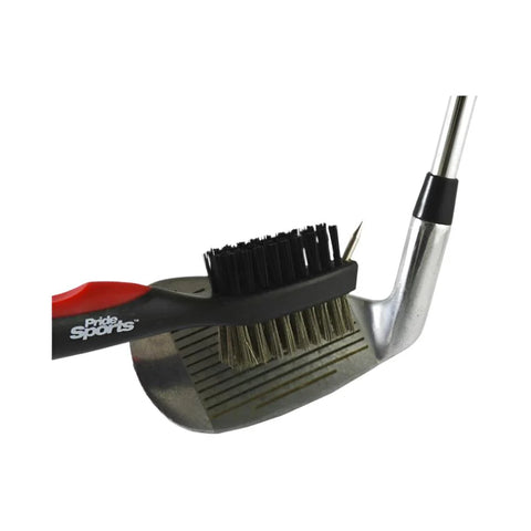 The black and red Pride Sports Deluxe Golf Brush by Pride, with dual-brush heads, cleans the grooves of a silver golf club head for quick and effective club cleaning.