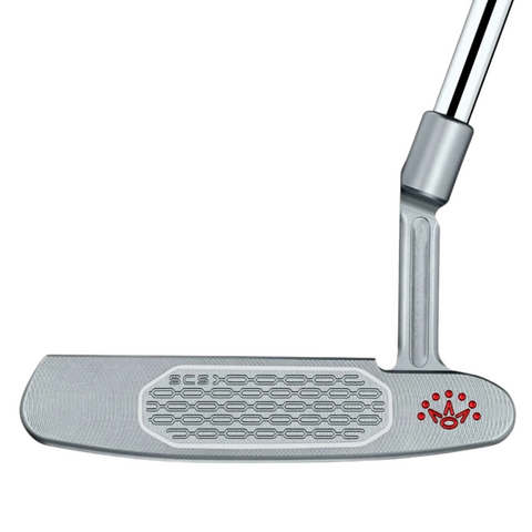 The Scotty Cameron 2025 Studio Style Newport Plus Putter features a silver, precision-milled face with a hexagonal pattern and red crown logo on the bottom right of the clubhead. The angled shaft attaches at the top right.