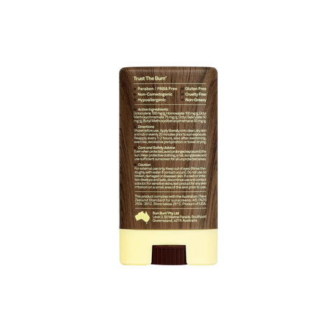 A brown and beige Sun Bum SPF 30 Face Stick (13g) featuring ingredient, benefit, and brand info on the back. The label highlights mess-free, hypoallergenic sun protection, free from parabens, gluten, and cruelty.