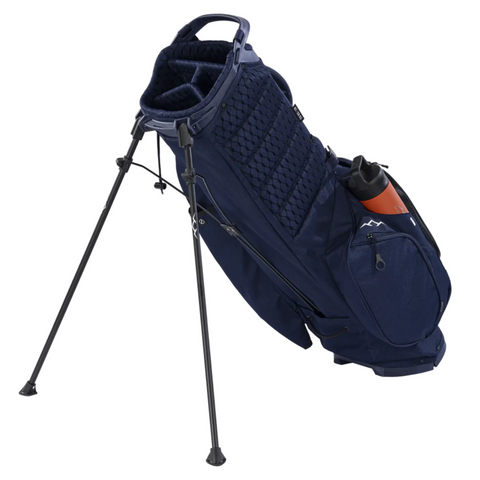 A navy blue Sun Mountain E-3.5 Carry Bag 2025 features two extended legs, multiple zippered pockets, a textured front panel, and an orange water bottle in the side holder, shown against a white background.