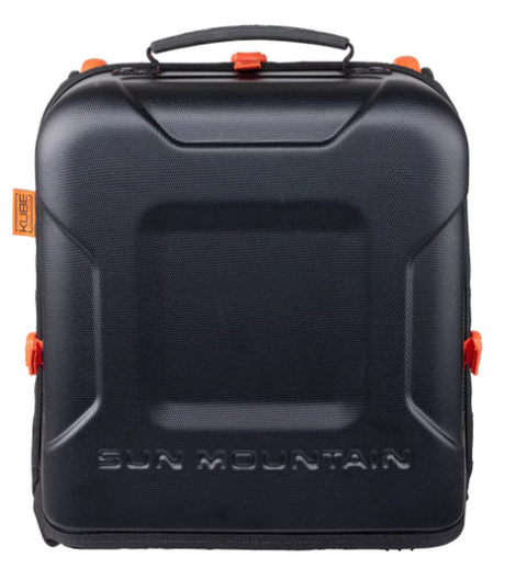 The Sun Mountain Kube Travel Cover is a black, square hard-shell case with a top handle, orange latches, and Sun Mountain logo. An orange Kube tag highlights its compact golf bag protection as a premium travel cover.