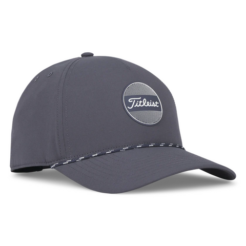 The Titleist 2025 Boardwalk Rope Cap is a dark gray golf hat featuring a round logo patch and stylish black-and-white rope accent above the brim—ideal for any golf enthusiast.
