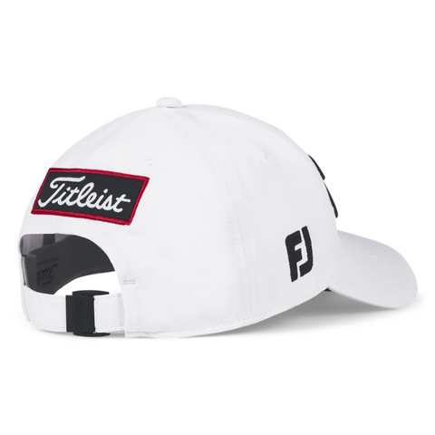 The Titleist 2025 Tour Performance Cap in white is shown from the back, with a black adjustable strap, Titleist logo patch with red border, and black FJ side logo—a premium performance golf hat by Titleist.