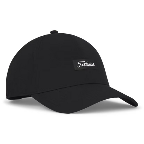The Titleist 2025 Womens Charleston Breezer Cap in Black/White features a curved brim and front patch with white Titleist script, offering stylish UV protection for women on sunny days.