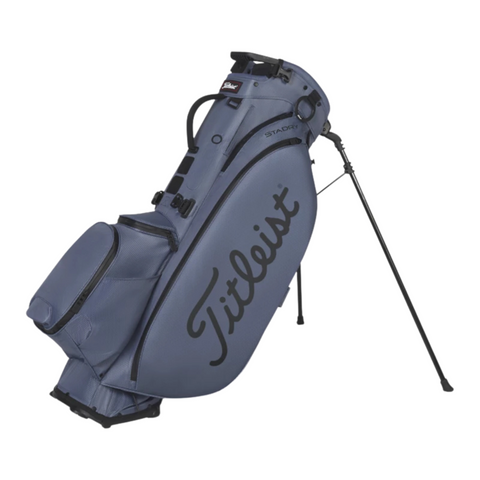 The Titleist Players 5 StaDry Stand Bag by Titleist features a blue design with black accents, waterproof construction, multiple zippered compartments, extended legs for easy standing, and the Titleist logo in bold black letters on the side.